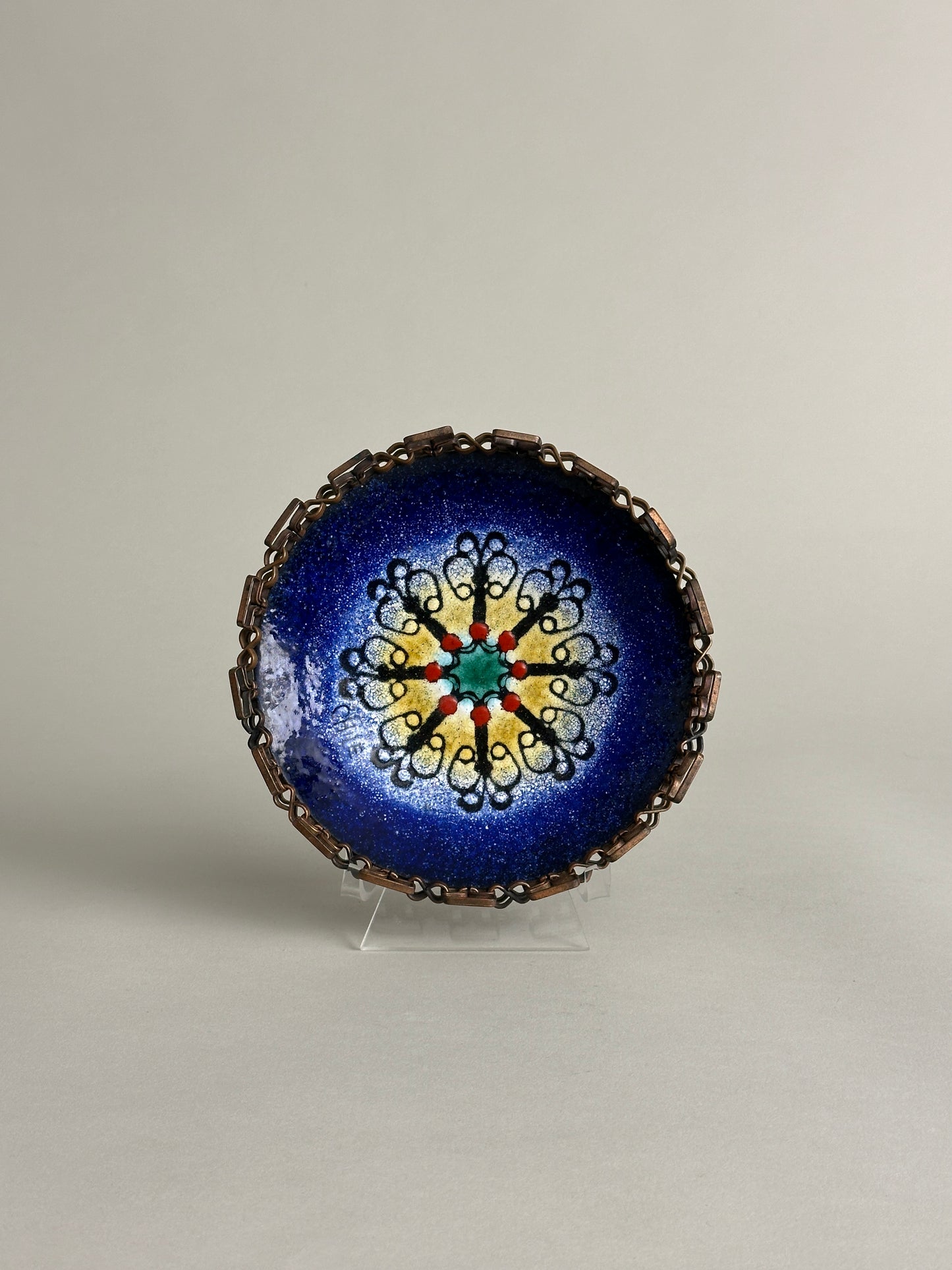 CHILEAN ENAMEL PLATE WITH BRAIDED COPPER EDGING