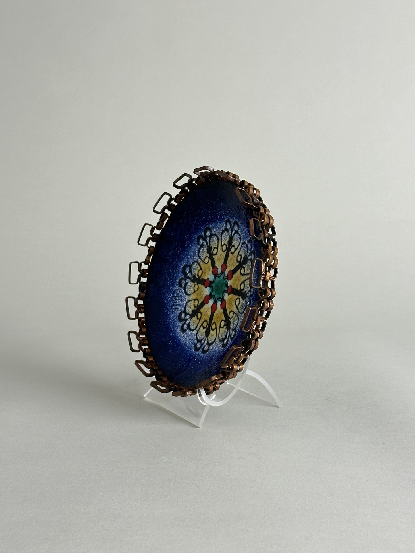 CHILEAN ENAMEL PLATE WITH BRAIDED COPPER EDGING